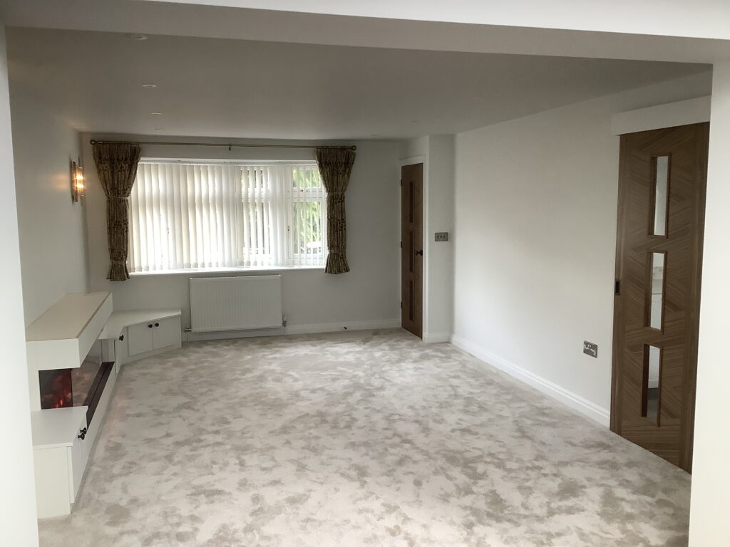 Living room inside a single storey rear extension in Bulkington