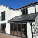 Double-storey rear extension with bi-fold doors and Juliet balcony built by Parker Grears Developments in Nailstone, Leicestershire