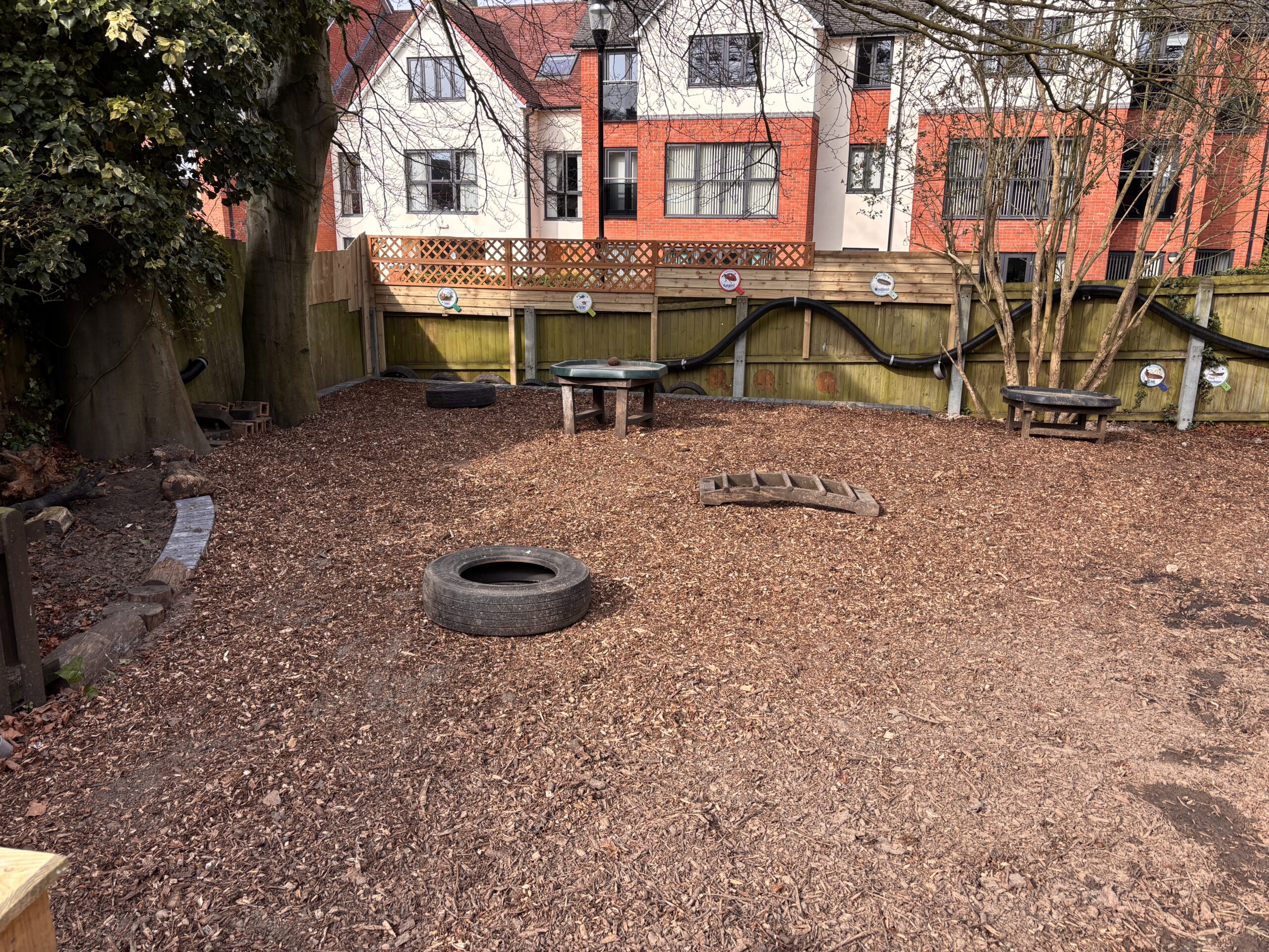 New woodland play area with retaining wall