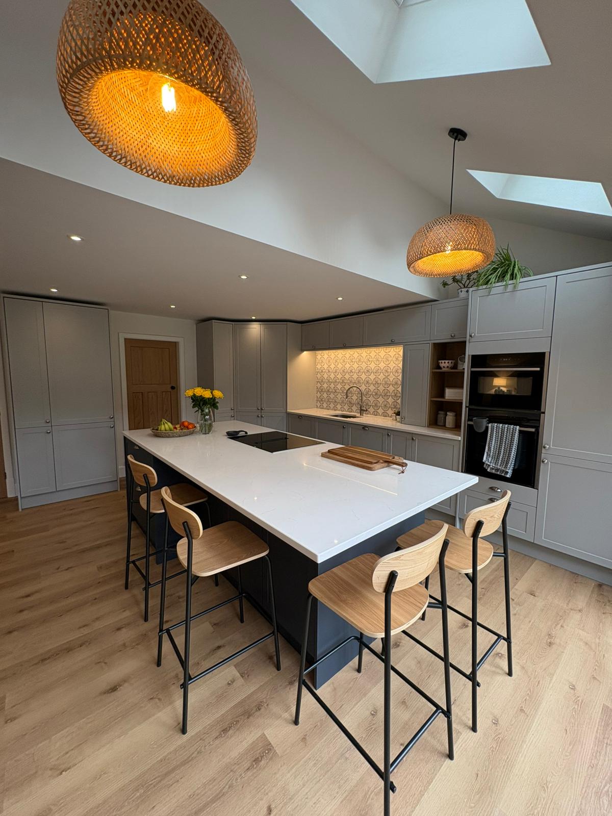 Open-plan single-storey kitchen extension with vaulted ceiling and skylights by Parker Grears Developments in Nailstone