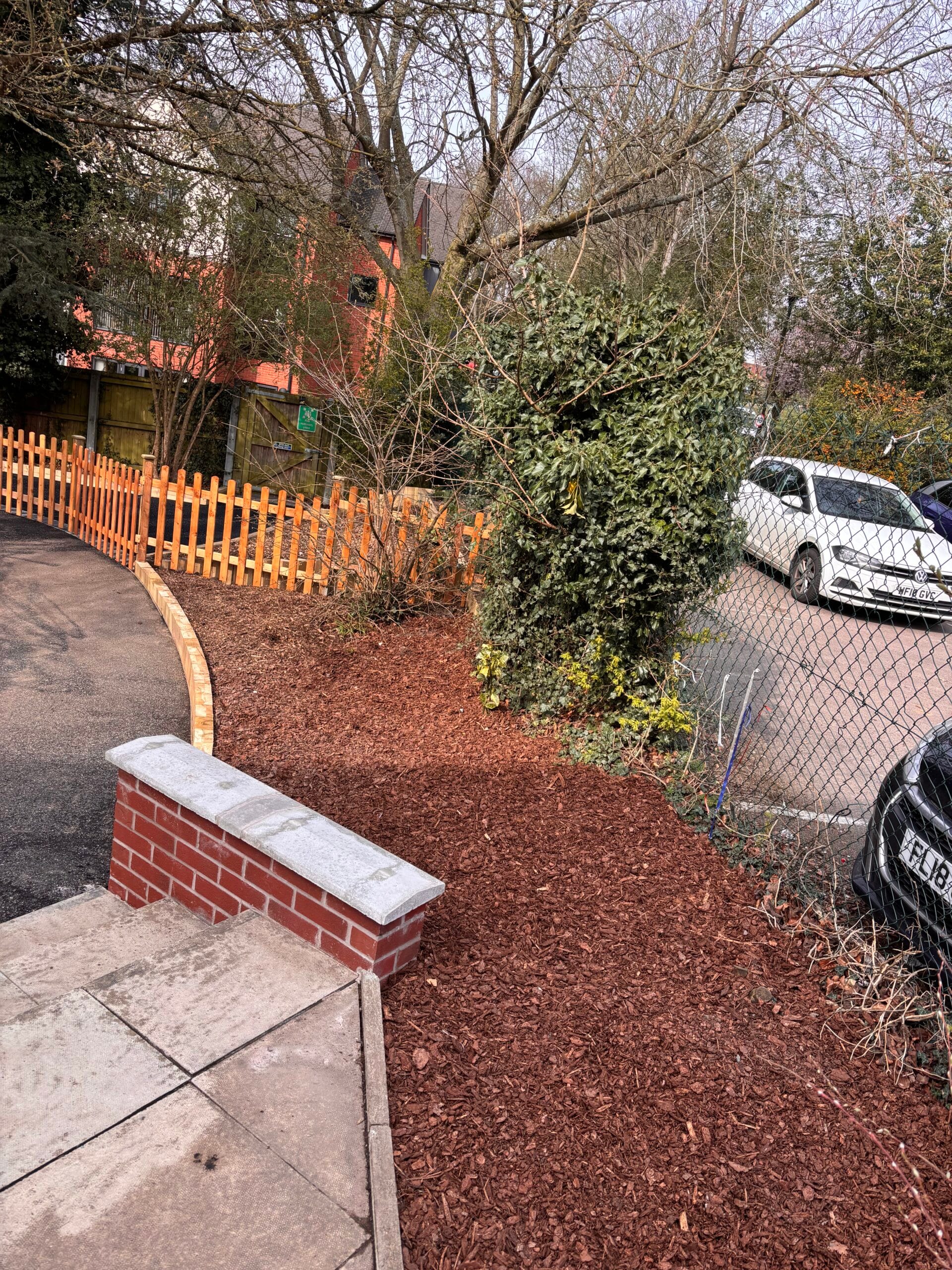 New planting area and retaining wall by steps
